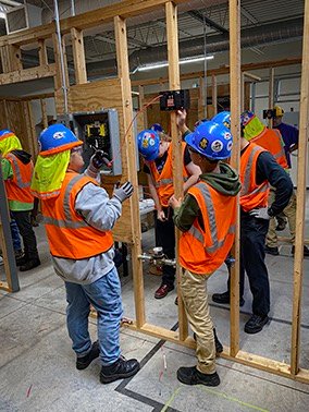 Electrical team working on rough-in wiring