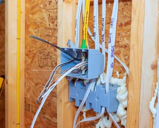 Residential electrical wiring box during rough-in work