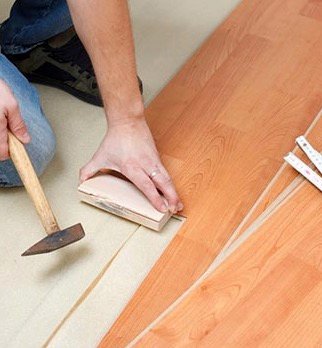 Luxury vinyl plank flooring installation detail